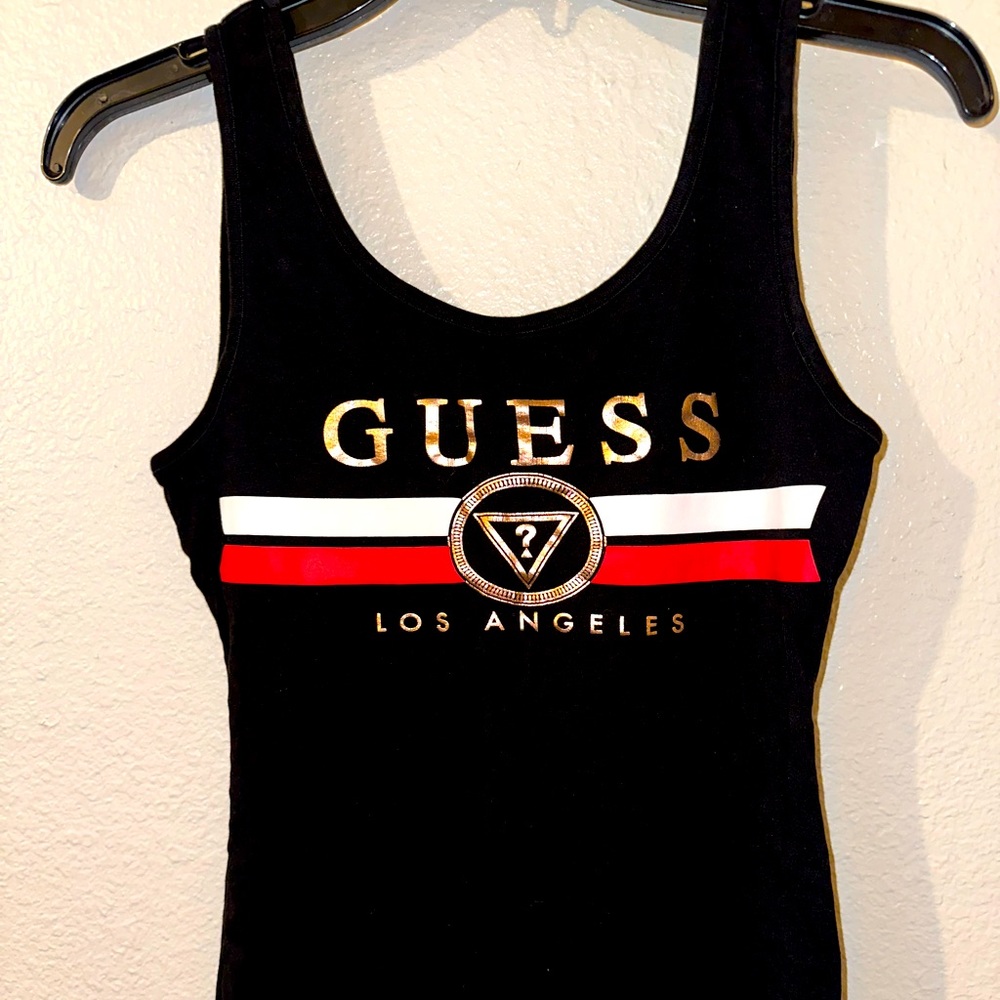 Black tank top with the Guess logo on it. Originally from Marshall’s,size small.